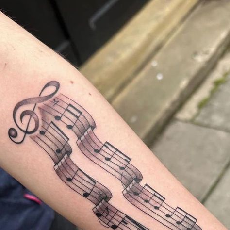 Hammersmith Tattoo London on Instagram: "The Staff and Musical Notes Tattoo by @stalstattoo 🎶🎵 To book your tattoo with Tom contact us: ☀️ @stalstattoo ☀️ @hammersmith_tattoo_london #tattoo #thestafftattoo #notestattoo #musicalnotestattoo #londontattoo #tattoolondon #hammersmith #hammersmithtattoo #london" Music Staff Tattoo Designs, Musical Notes Tattoo, Music Staff Tattoo, Sheet Music Tattoo, Notes Tattoo, Note Tattoo, London Tattoo, Just Ink, Music Tattoo