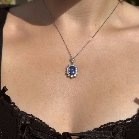 New in! A marvellous sapphire diamond pendant necklace boasting a deep-blue cushion cut sapphire in the centre, weighed at 2.91 carats. It’s complemented by a frame of twelve bright, clean brilliant-cut diamonds and four more on the bale above. They have excellent VS1 clarity - H colour and total 2.57 carats. The pendant is fashioned in 900 platinum and features a fancy, basket under-gallery on the reverse, stamped with the stone weights. It’s accompanied by a silky box chain to display it ... Blue Gem Necklace, Diamond Locket, Sapphire Diamond Pendant, No Code, Blue Gems, Layered Jewelry, Sapphire Necklace, Sapphire Jewelry, Precious Gems