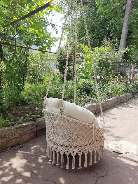 The hanging hammock chair in ivory with chic and rich cushions to match was custom made for a charming New York customer. At her request, I increased the diameter of the seat to 80 cm, and weaved the straps longer for ease of fastening in a certain place. The work took 2 weeks. Therefore, if you have specific ideas for the design of a hanging hammock chair, I will bring them to reality with great pleasure!) Hanging Macrame Chair, Macrame Chair, Macrame Hanging Chair, Macrame Hammock, Hanging Hammock Chair, Hanging Hammock, Garden Swing, Macrame Patterns Tutorials, Hanging Macrame