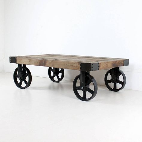 wheeled coffee table by out there interiors | notonthehighstreet.com Cart Table, Wood Cart, Barbary Coast, Cart Coffee Table, Table With Wheels, Coffee Industry, Industrial Coffee Table, Solid Wood Coffee Table, Table Cafe