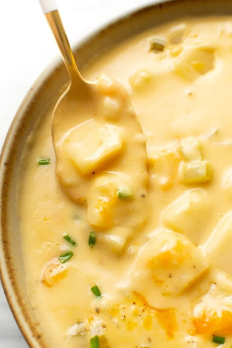 This creamy and cheesy potato soup recipe is a family favorite with its super comforting rich cheddar broth! It's simple to make in just 35 minutes and uses everyday ingredients. Homemade Cheesy Potato Soup, Easy Light Soup Recipes, Cheese Soup Recipe Velveeta, Velveeta Potato Soup, Cheesy Potato Soup Recipe, Cheesy Potato Soup Easy, Potato Soup Vegetarian, Cheddar Potato Soup, Cheese Potato Soup