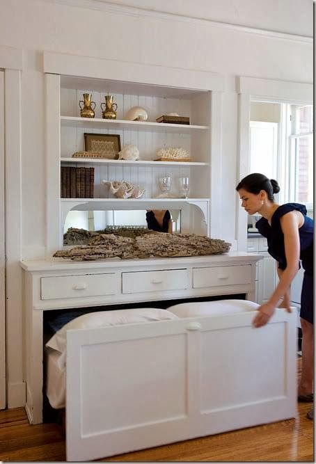 I can honestly say I have never seen a trundle bed tucked away in a built-in armoire.  This was original... Built In Daybed, Bachelor Apartments, Canadian House, Space Bathroom, Bathroom Remodel On A Budget, Remodel On A Budget, Daybed With Storage, Daybed With Trundle, House Plans Farmhouse