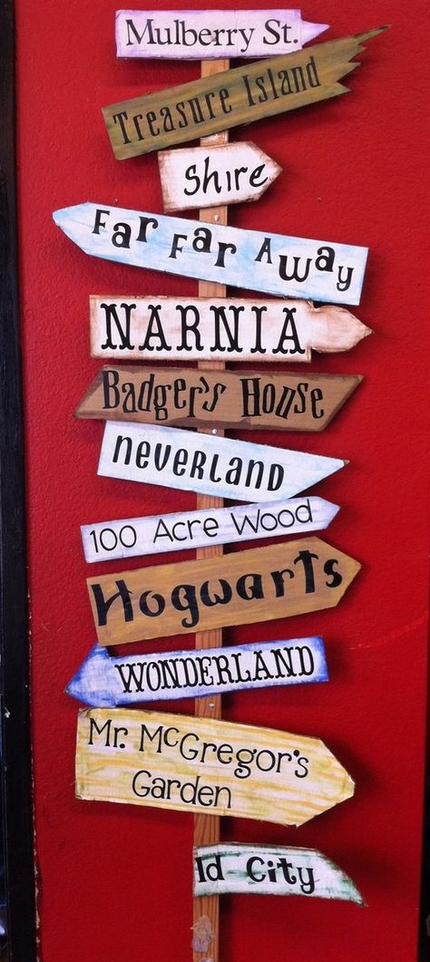 A story signpost. Use settings from children's books, musicals & plays, literature, places your family has traveled. Can use for a library, classroom, stage, garden, etc. Reading Display, Library Bulletin Boards, School Displays, Reading Area, Book Corners, Dr Suess, Library Displays, Library Decor, Classroom Door