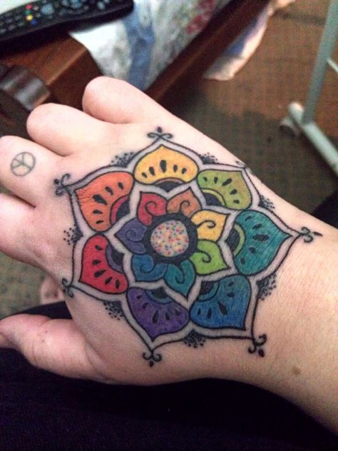 My new rainbow mandala hand tattoo, all puffy and fresh :D So happy! Color Wheel Tattoo, Cosmetology Tattoos, Colorful Mandala Tattoo, Metal Tattoos, Mandala Hand Tattoos, Flower Tat, Pride Tattoo, Rainbow Tattoos, Birthday Tattoo