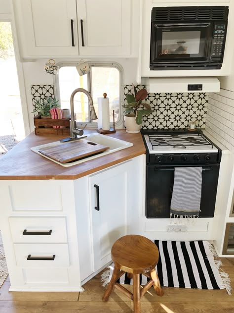 The black and white tiles are from the Cement Tile Shop. The butcher block countertop is from IKEA. Ikea Tiny Kitchen, Camper Vintage, Kitchen Remodel Countertops, Kitchen Countertop Materials, Rv Makeover, Bus Life, Interior Remodel, Rv Decor, Rv Interior