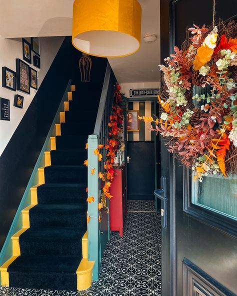 Now vs Then! Can you believe this is the same hallway? The power of paint and moody decor 🖤🌈 Our whole colourful journey started with that yellow lampshade! When then matched the shade to the colour on the stairs and it all kind of snow balled from there. I never planned to have so many colours but it all just kind of came together 💛 I feel like it’s perfect for decorating during the ‘ber months too 🍂 #hallwaydecor #moodydecor #powerofpaint #transformationtuesday #beforeandafter #pain... Hall And Stairs, Yellow Lampshade, The Ber Months, Yellow Stairs, Christmas Hallway, Manchester House, Ber Months, Moody Decor, Maximalist Interior