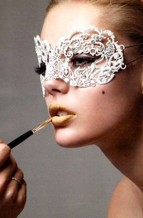 Cut out doily to mask shape, coat with lacquer make firmer, add faux diamonds, elastic to tie on each side.  The trick would be finding a paper doily that worked. Something with a long straight edge like this perhaps?  You might get lucky at the dollar store? Kristina Webb, Frida Gustavsson, Mask Shapes, Anja Rubik, Lace Mask, Carnival Masks, Masks Masquerade, Recycled Fashion, Masquerade Party