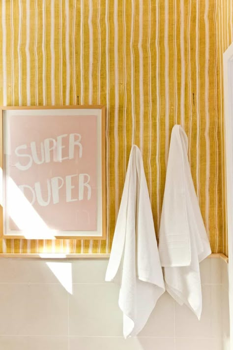 Small Bathroom Funky Wallpaper, Guest Bathroom Rental, Removable Wallpaper For Renters Bathroom, Playful Bathroom Ideas, Bright Guest Bathroom, Small Bathroom Redo On A Budget, Retro Wallpaper Bathroom, Bathroom Wallpaper Half Wall, Yellow Bathroom Wallpaper