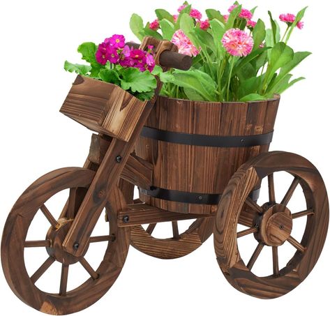 PRICES MAY VARY. Sturdy & Stable: Constructed with premium wood and solid screws. Equipped with 3 large wheels which makes the movement stable and convenient, even if it is filled with dirt and plants. Large Storage Space: The deep planting barrel can contain different kinds of plants. Decorate your garden with different flowers as season changes. Even in the autumn and winter, it can be filled with haystacks and mini-trees or decorative snowmen. The extra storage box can be used for garden tool Wood Raised Beds, Backyard Garden Patio, Wood Cart, Plant Pot Stand, Plants For Raised Beds, Garden Planters Pots, Cart With Wheels, Wagon Cart, Small Flower Pots