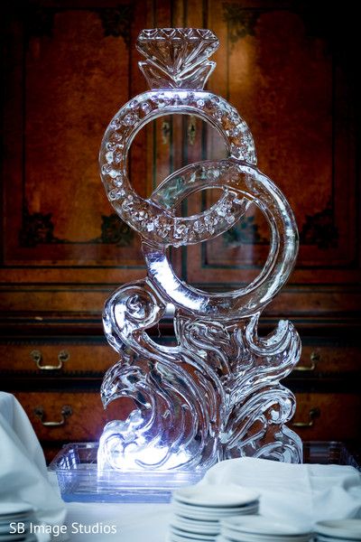 Ring shaped ice sculpture. Wedding Ice Sculpture Ideas, Isomalt Sculpture, Ice Sculptures Wedding, Wedding Ice Sculpture, Ice Sculpture Wedding, Wedding Sculpture, Ice Luge, Shape Ideas, Ice Carving