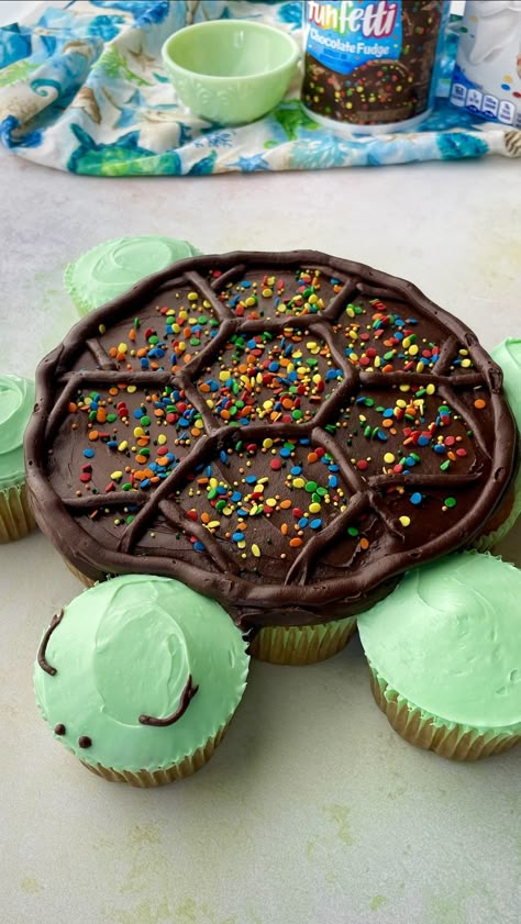 Turtle Pull Apart Cupcake Cake Recipe - Pillsbury Baking Turtle Pull Apart Cupcakes, Wolf Pull Apart Cupcake Cake, Sea Turtle Cupcake Cake, Turtle Pull Apart Cupcake Cake, Turtle Cupcake Cakes Pull Apart, Ocean Pull Apart Cupcakes, Sea Turtle Birthday Party Ideas, Turtle Cupcakes Ideas, Turtle Shaped Cake