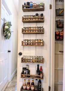 Spice Racks On Pantry Doors, Pantry Door Chalkboard, Boho Pantry Door, Spice Rack Ideas Diy, Dollar Tree Pantry Organization Ideas, Wood Pantry Door, Dollar Tree Pantry Organization, Spice Rack Door, Spice Rack On Pantry Door