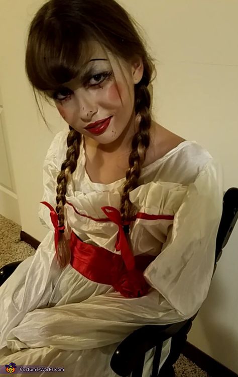 This is my 11 year old daughter Jewels wearing her Annabelle look. She loves to be scary things and wanted me to do her makeup like the doll. Her mask was created all with makeup. Doll Makeup Halloween Scary, Annabelle Halloween Makeup, Annabelle Costume Makeup, Annabelle Doll Costume, Annabelle Makeup Halloween, Annabelle Doll Makeup, Annabelle Halloween Costume, Halloween Scary Costumes, Annabelle Makeup