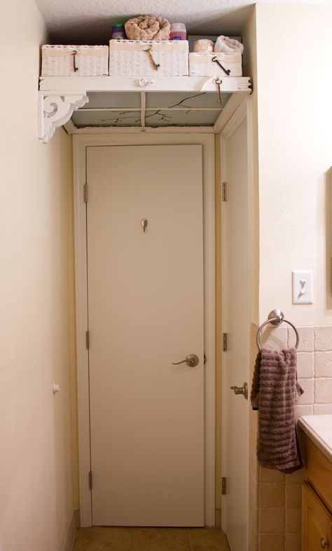 Bathroom Shelf/Storage - Took the "shelf above a door" idea a little further.  I used an antique window frame and backed it with a painted piece of plywood.  Set it on top of the door frames and placed the brackets on the left.  The baskets complete the look and there's 3' of storage space above your head when you walk into the bathroom. Above Door Shelf, Over Door Shelf, 2024 Growth, Over The Sink Shelf, Bathroom Door Ideas, Shelves Above Toilet, Bathroom Upstairs, Over Toilet Storage, Tall Bathroom Storage Cabinet