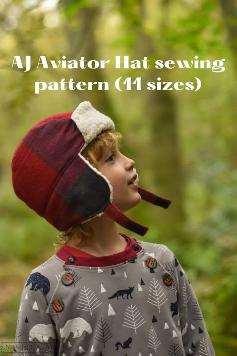 AJ Aviator Hat sewing pattern (11 sizes). It's a wonderfully warm and cosy hat that is perfect for anyone who wants to look like an aviator and who enjoys the outdoors. The designer rates her sewing project as suitable for enthusiastic beginner sewers. SewModernKids Aviator Hat Pattern Sewing, Aviator Hat Pattern Free, Baby Hat Sewing Pattern Free, Aviator Hat Pattern, Winter Hat Sewing Pattern, Trapper Hat Pattern, Fleece Hat Tutorial, Baby Hat Sewing Pattern, Fleece Hat Pattern