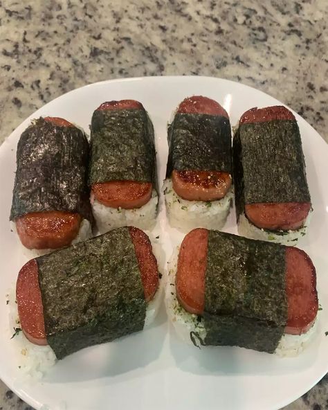 Get a taste of the islands with homemade Spam Musubi! Simple, savory, and so satisfying. 🌺🍙 Spam Musubi Hawaiian Spam Musubi Delight Ingredients: 2 cups uncooked short-grain white rice 2 cups water 1 (12-ounce) can Spam 1/4 cup soy sauce 1/4 cup oyster sauce 1/4 cup white sugar 5 sheets nori (dry seaweed) Furikake (optional) Directions: Rinse the rice under cold water until the water runs clear. Cook the rice with 2 cups of water in a rice cooker or on the stovetop according to package i... Hawaiian Spam Musubi Recipe, Hawaiian Spam Musubi, Homemade Spam, Spam Musubi Recipe, Musubi Recipe, Spam Musubi, My Favorite Food, So Satisfying, Oyster Sauce