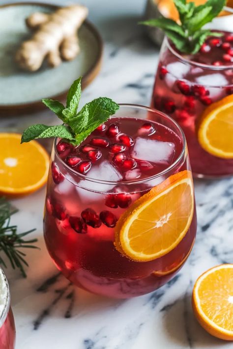 A photo of a  Pomegranate Ginger Punch a christmas punch Pomegranate Punch Recipes, Easy Christmas Punch, Pomegranate Punch, Festive Holiday Drinks, Holiday Drinks Alcohol, Alcoholic Punch Recipes, Christmas Drinks Recipes, Christmas Drinks Alcohol, Drinks Recipe