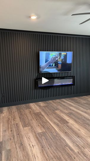 1.9K views · 119 reactions | It’s a BLACK ON BLACK SLAT WALL TING. 
🖤♠️😎

#panelwalldazzu 
#accentwall 
#featurewall 
#accentwallideas 
#slatwall | PANEL WALL DAZZU | dazzuremodeling · Original audio Black Slat Wall, Wall With Tv, Panel Wall, Slat Wall, Black On Black, Feature Wall, Wall Paneling, A Black, Accent Wall