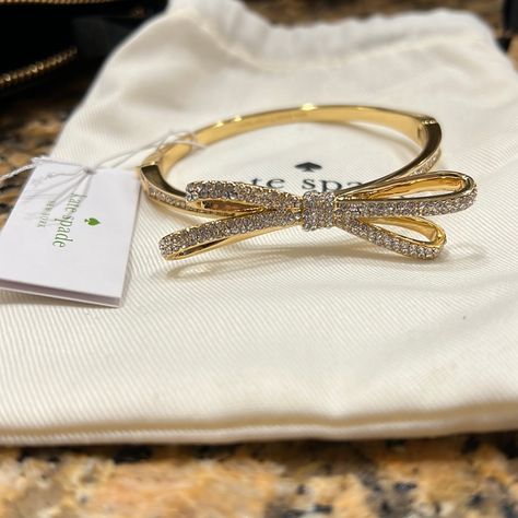 Jewelry Gold Aesthetic, Kate Spade Bow Bracelet, Golden Accessories, Dope Jewelry Accessories, Kate Spade Bracelet, Kate Spade Bangle, Wrist Jewelry, Luxury Bracelet, Dior Jewelry