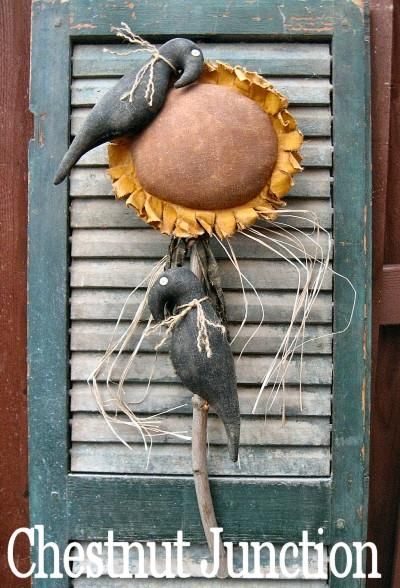 Primitive sunflower on a rustic stick, accented with two folky crows. Will measure 24" when complete. PDF epattern includes: supply list, pattern pieces, ste Sunflower Projects, Primitive Fall Crafts, Primitive Sunflowers, Christmas Primitive Decor, Sunflower Crafts, Primitive Patterns, A Crow, Crafts Sewing Patterns, Primitive Fall