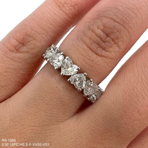 Indulge in eternal love with our exquisite 3.92 Cts Heart Shape Natural Diamond Eternity Band. Featuring high-quality diamonds in a heart shape, this band brings a touch of luxury to any look. Perfect for special occasions or everyday wear, this band will be a timeless addition to your jewelry collection. DIAMOND 3.92 HS TCW 16 PCS E-F VVS2-VS118K WG 3.15 GRAMS SIZE 5.00 RS-1065 Fancy Shape Diamond Ring, Heart Eternity Ring, Heart Diamond Ring, Diamond Heart Ring, Diamond Eternity Band, Half Eternity Ring, Heart Shaped Diamond, Fancy Diamonds, Heart Wedding