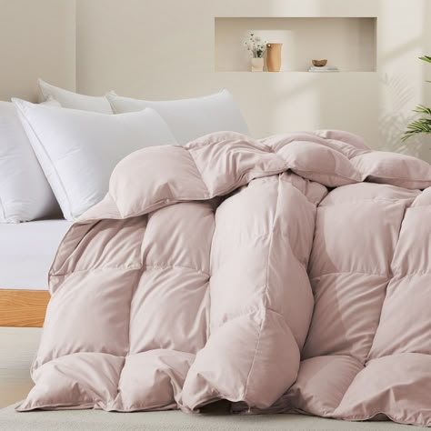 Balance casual luxury and contemporary style with this white down comforter duvet insert, lightweight and medium weight versions to meet your various needs throughout the whole year. It is filled with premium 5% white goose down and 95% white goose feather fiber to provide you a quality sleeping throughout the night. Covered with a ultra soft and down-proof polyester cover, this comforter provides extra softness and comfort with noiseless. Ultra soft and noiseless fabric does not make noise when