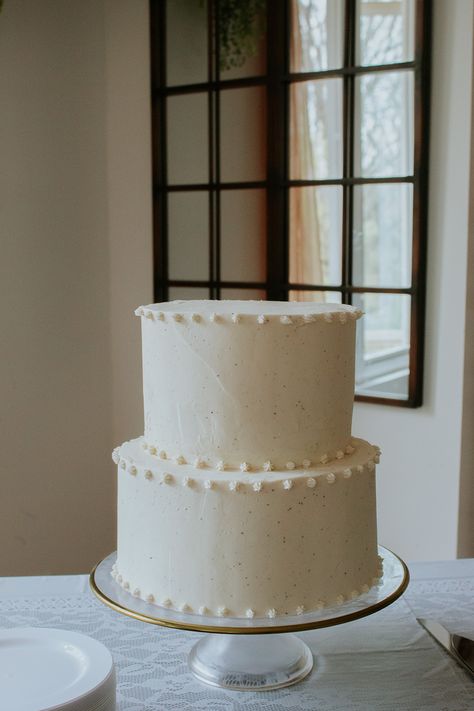 Wedding inspo, weddings, chic wedding, ideas, elegant wedding, white cake, pretty, small wedding cake, traditional cake, modern wedding, wedding decor, green and white Simple Wedding Cake Small Two Tier, Small Traditional Wedding Cakes, Plane White Wedding Cake, Two Tiered Simple Wedding Cake, Minimal Icing Wedding Cake, Basic Wedding Cake Simple, Simple Cakes Wedding, Wedding Cake Ideas Elegant Simple, Simple Piped Wedding Cake