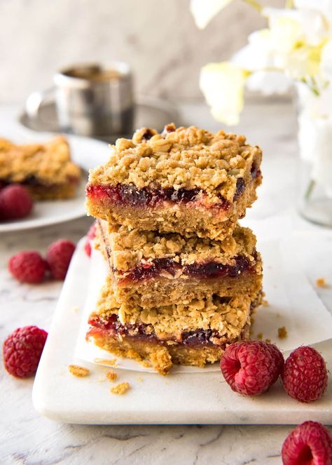 Raspberry Bars - One of the fastest bars to make from scratch, these have an oatmeal biscuit base, raspberry jam and a crumbly oatmeal topping. Just 10 minutes prep! www.recipetineats.com Jam Bars Recipe, Raspberry Jam Bars, Raspberry Crumble Bars, Jam Bars, Raspberry Crumble, Raspberry Bars, Crumb Bars, Chocolate Chip Cookie Mix, Sugar Cookie Mix