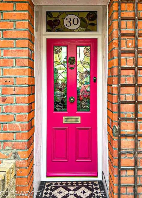 Pink Nouveau Victorian Door fitted into a london home. Antique brass door furniture. Bespoke stained glass with a rennie mackintosh theme. Glass above door with number in stained glass Hot Pink Door Exterior, Front Door Victorian, Entrance Tiles, Stained Glass Front Door, Victorian Front Door, Pink Doors, Victorian Doors, Victorian Front Doors, Georgian Doors