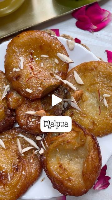 Shilpi Sharma on Instagram: "Bhakti ke es meethe anubhav mein, prasad ka swaad hi kuch khaas hai. 🌸🌸 Celebrate the auspicious occasion of Pran Pratishtha’ in Ayodhya Ram Mandir. Offer this delicious Malpua with this easy recipe. ✨✨  Malpua🌸  Ingredients: For the Malpua 1 cup gehu ka Aata 2 tbsp rava/sooji 1 tos crush fennel seeds 1 cup milk + more if required during whisking if the batter feels too thick  For Chashni: 1 cup powdered sugar 1 cup water 2 cardamom pods 3-4 saffron strands cook for 4-5 min only  Keep following @myexperiencediaries 🙏🏻🙏🏻  #jaishreeram #rammandir #rammandirspecial #prasad #prashad #laddoo #indiansweets #indiansweets #sweetrecipe #sitaram #hanuman #reelitfeelit #reelkarofeelkaro #goodfood #rambhakt #indianfoodbloggers" Malpua Recipe How To Make, Pran Pratishtha, Malpua Recipe, Ayodhya Ram Mandir, Ayodhya Ram, Cardamom Pods, Indian Sweets, Fennel Seeds, Fennel