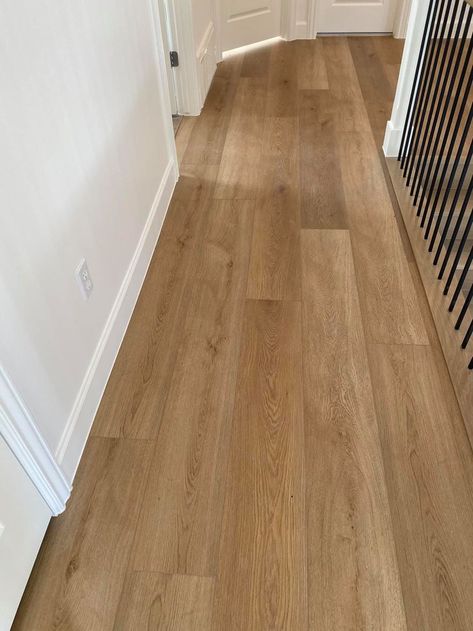 Hallway using Citadel by Paradigm, showing off deep brown, gold and subtle orange accents for a rich natural oak that doesn't feel heavily traditional. Paradigm Conquest Flooring, Blonde Laminate Flooring, Blonde Wood Floors, Blonde Flooring, Modern English Country, Vinyl Wood Flooring, Maple Floors, Lvp Flooring, Waterproof Flooring