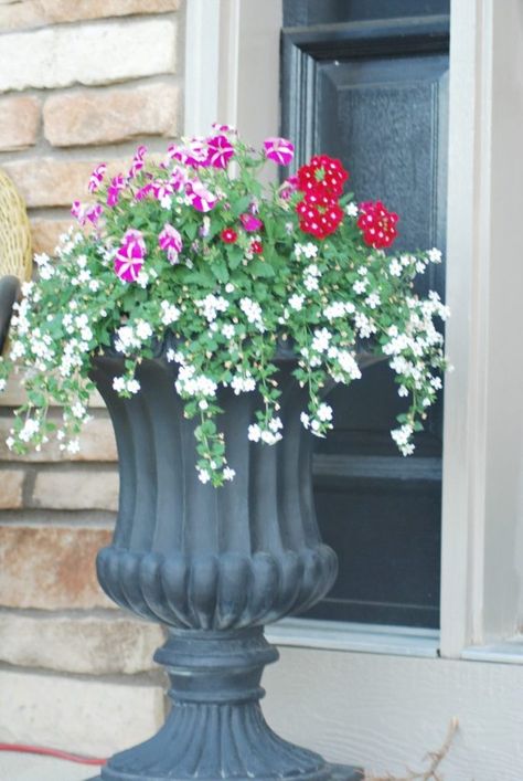 How to Add Height to Urn Planters - Everyday Edits Porch Urn Planters, Plant Urns Front Doors, Flower Urns Front Door, Pedestal Planter Ideas, Garden Urns Ideas Planters, Urn Planters Ideas, Front Porch Urns Planters, Outdoor Urn Planter Ideas, Urn Planters Front Door