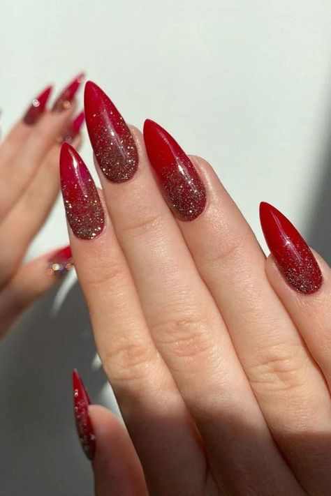 21 Elegant Red Glitter Almond Nails Designs | Stunning & Stylish Nail Ideas Red Base Nail Designs, Red Gold Ombre Nails Glitter, Red Nails With Glitter Ombre, Red Christmas Nail Designs Almond, Red Glitter Ombré Nails, Red And Silver Sparkle Nails, Red Gold Ombre Nails, Red Glitter Ombre Nails Acrylic, Golden Red Nails