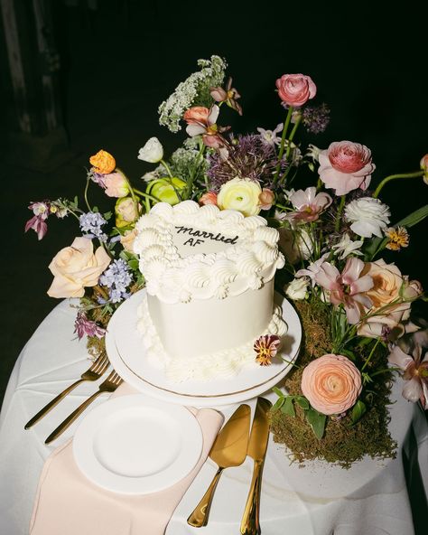 We fell in love with this mini cake & meadow!! All of the tiny details at Lexi & Barry’s wedding really made the day so special. We’d love to do more meadows added to guest tables, cake tables, just about anywhere a whimsical table top garden could grow!! Foam-free, as always 💘🦋 Captured by the sweetest @meagencphotography #weddingcake #cakemeadow #cakegarden #sustainablewedding #kywedding Floral Cake Design Wedding, Garden Wedding Cake Table, Mini Wedding Cakes For Each Table, Whimsical Flowers Wedding, Wedding Cake Meadow, Wedding Cake Set Up, Beautiful Wedding Cakes Romantic, Kitsch Wedding Cake, Cake Table Set Up