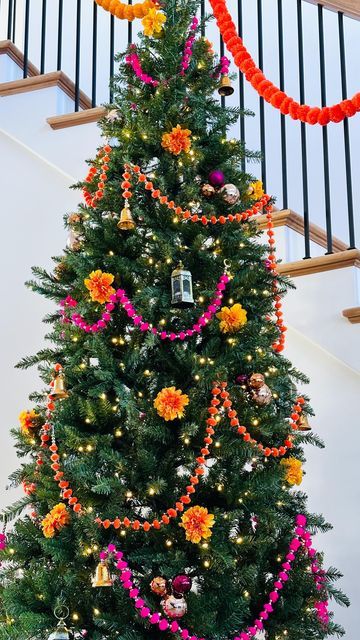 Neeta I DIY l Interior Design on Instagram: "My @kingofchristmas 9’ Yorkshire Fir Slim prelit tree is getting some sparkle today with some magenta and copper baubles. I’m grouping these ornaments together with some ornament hooks and adding these bunches of three all over for that added shine. I love how vibrant my Indian inspired tree turned out! What do you think?

For the best pre-lit trees check out @kingofchristmas 

#kingofchristmas #indianchristmastree #ethnicdecor #putyourspinonit #orangeandpinkchristmastree #vibrantchristmastree" Indian Christmas Decorations, Indian Christmas Tree, Indian Christmas, Lit Trees, Girl Shoulder Tattoos, Tree Inspiration, Prelit Tree, Diwali Party, Ethnic Decor