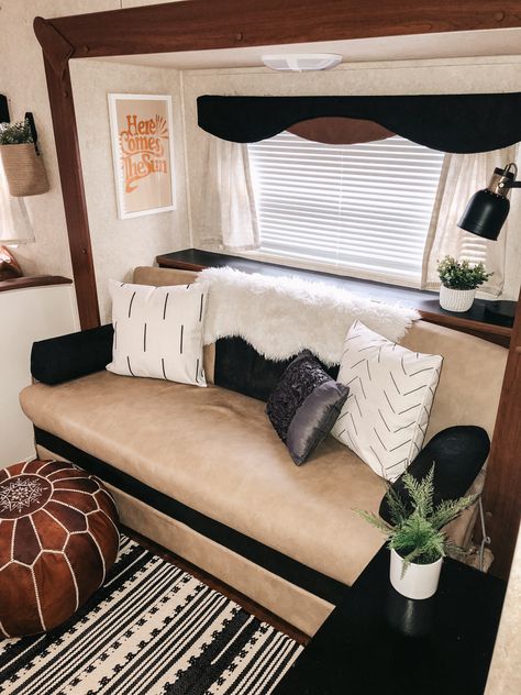 Dark Boho Camper Interior, Dark Camper Interior, Dark Wood Camper Decor, Boho Rv Interior, Rv Remodel Black Cabinets, Western Rv Remodel, Brown Rv Interior, Camper Windows, Rv Redo