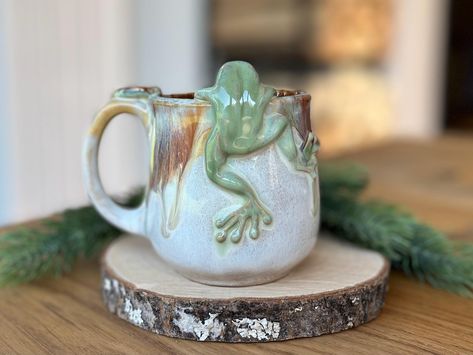 This unique mug will make your morning coffee or tea truly magical - a beautiful way to start your day! Approximate Size: Capacity - 10 fl.oz/ 300 ml In diameter - 2.9 inches/ 7.5 cm; Height - 3.5 inches/ 9 cm Mushrooms have a long history of being used for food, healing and spirituality thus they symbolise resilience, good relationships, nourishment, healing and flexibility. This original cup and decors is made from stoneware. Dishwasher and microwave safe. *Shipping Your order is SHIPPED FROM Food Healing, Mushroom Cup, 3d Ceramic, Small Coffee Cups, Sculptures Céramiques, Financial Abundance, Pretty Mugs, Fairy Gifts, Mug Handmade