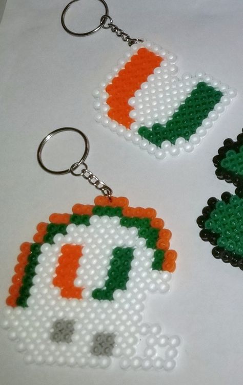 Miami Hurricane keychains! Our custom perler patterns! Football Teams, Perler Patterns, Fuse Beads, Perler Bead, Plastic Canvas Patterns, Canvas Patterns, Plastic Canvas, Perler Beads, Ponies