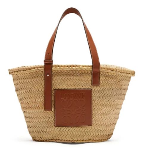 The One Bag French Girls Will Never Buy | Who What Wear UK French Basket, Straw Basket, French Girls, Woven Raffia, Straw Bags, Raffia Bag, Rosie Huntington Whiteley, Woven Basket, Trending Handbag