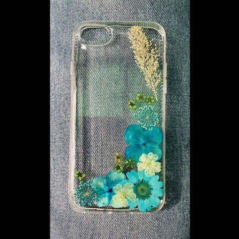 Resin | Candles | Gifts on Instagram: "Introducing our new customised resin real dried flowers phone covers 🌸 Customisation of flowers and phone covers available. DM Us To Order price will differ according to the design. #resinart #resin #resinartwork #phonecover #phonecovers #phonecases #fyp #trending #reels #explore" Resin Cover Phone, Resin Phone Cover Design, Resin Phone Cover, Diy Resin Phone Case, Wallpaper Sky, Phone Cover Design, Trending Reels, Iphone Wallpaper Sky, Apple Phone Case