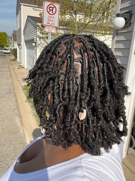 Locs With Cowrie Shells, How To Put Shells On Locs, Cowrie Shell Locs, Cowrie Shells On Locs, Loc Shells, Female Locs Hairstyles, Locs With Seashells, Shells In Locs, Shells On Locs