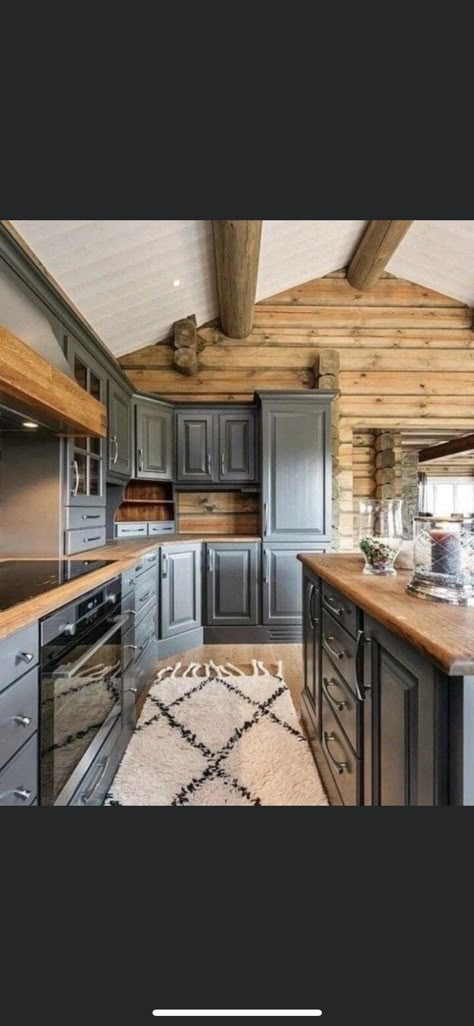 Kitchens In Log Cabins, Log Cabin Cabinets, Cabin Cabinet Colors, Wooden Cabin Kitchen, Log Cabin Homes Interior Kitchen, Log Cabin Farmhouse Style, Modern Log Cabin Kitchen, Log Cabin Kitchens Cabinets, Rustic Cabin Kitchen Ideas