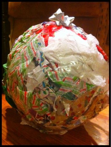 Fun game for holiday parties! make a big ball with lots of layers of tape and old wrapping paper filled with gifts, start with the youngest and the person to the right has the dice, they start dislodging gifts and candy until doubles are rolled and then they pass it on.  Use gloves to make it harder. Ball On String Game, Tape Ball Game, Kids New Years Eve, New Years Ball, New Years Eve Games, Paper Ball, Xmas Games, Eve Game, New Year's Games