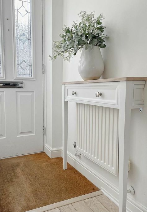 Easy way to transform your living space Radiator Shelf Decor, Small Entryway With Radiator, Window With Radiator Underneath, Radiator Cover With Shelves, Radiator Cover Table, Radiator Cover Hallway, Hiding Radiator Ideas, Radiator Shelf Hallway, Cover For Radiator Ideas