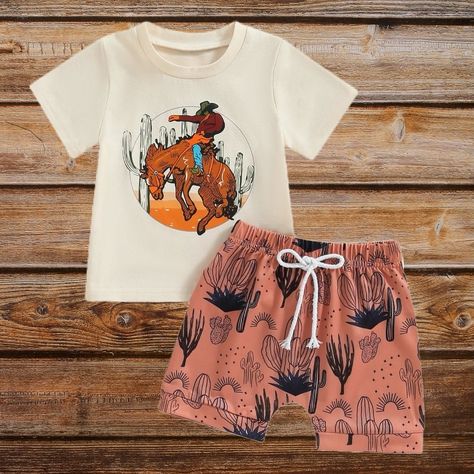 “Cutest little dude in his graphic two-piece set! 🍼👶👕 #LittleDude #BabyFashion #ToddlerStyle #CuteOutfits #MiniFashionista #OOTD #TrendyTots” Western Baby Boy, Western Summer Outfits, Cowboy Outfit, Toddler Boy Summer, Trendy Baby Boy Clothes, Western Baby, Western Babies, Baby Boy Summer