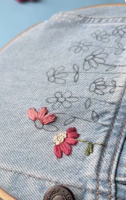 Diy Jean Embroidery Ideas, Hand Embroidery On Jean Jacket, Embroider On Jeans Diy, Sewing Flowers On Jeans, Embroidery Jeans Jacket Diy, Denim Embroidery Diy, Hand Embroidery On Jeans, Flare Jeans Diy, Jacket Embroidery Ideas