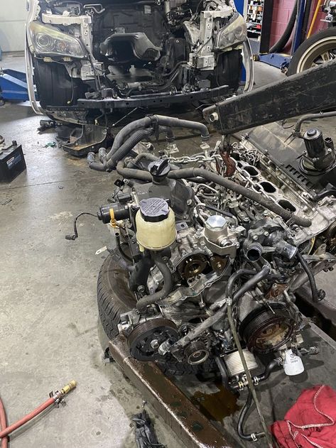 Replacing the engine on an Infiniti QX56. Chess Aesthetic Dark, Nolan Sawyer, Sawyer Aesthetic, Aesthetic Chess, Car Mechanic Garage, Chess Aesthetic, Player Aesthetic, Mechanics Aesthetic, Dark Academy Aesthetic