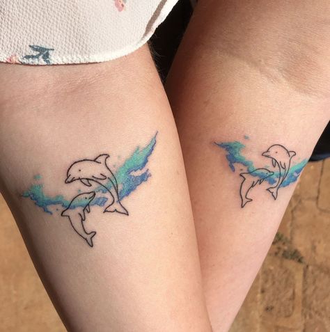 180 Creative Dolphin Tattoos Designs with Meanings (2023) - TattoosBoyGirl Matching Dolphin Tattoos, Two Dolphins Tattoo, Small Dolphin Tattoo, Dolphin Tattoo Meaning, Dolphin Tattoos, Dolphin Tattoo, Mum Tattoo, Dolphins Tattoo, Matching Sister Tattoos