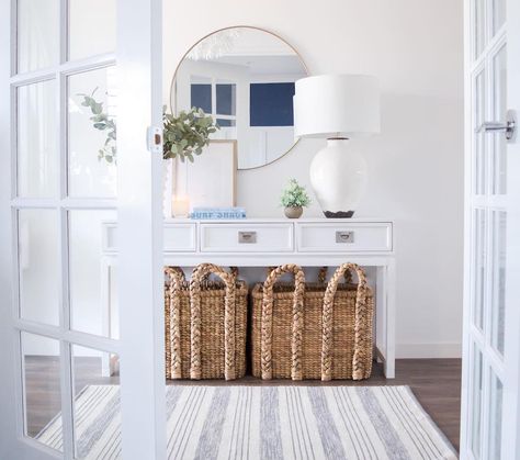 Hamptons Entryway, Hamptons Entry, Tiny Bungalow, White Canopy Bed, Modern Coastal Home, Modern Hampton, Basket Collection, Hamptons Coastal, Dark Blue Walls