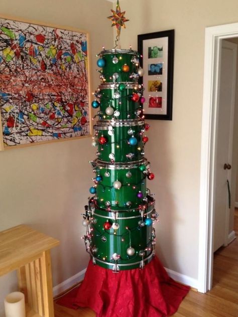 This drum Christmas tree to piss Spike off. Drum Christmas Tree Stand, Drum Ornaments Diy, Drum Christmas Ornaments Diy, Drum Christmas Tree, Unusual Christmas Trees, Music Furniture, Unique Drum Sets, Drum Room, Diy Music